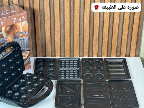 *صانعة الوافل والسندويتشاتذات